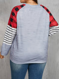 Plus size woman wearing Christmas tree plaid long sleeve shirt