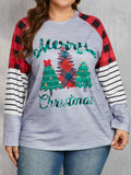 Plus size woman wearing Christmas tree plaid long sleeve shirt