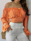 Women's off-shoulder cross strap long sleeve top